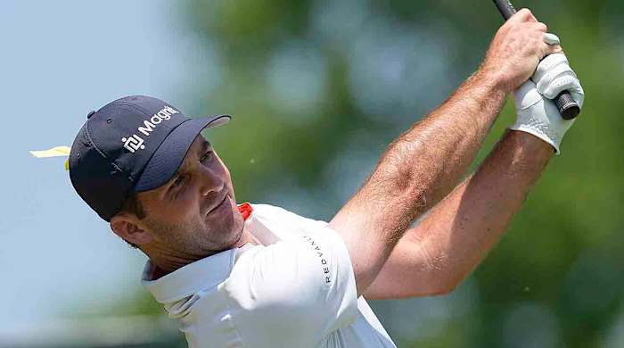 Denny McCarthy watches a shot at the 2023 Memorial Tournament.